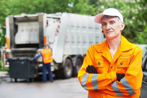 East London waste collection truck in action